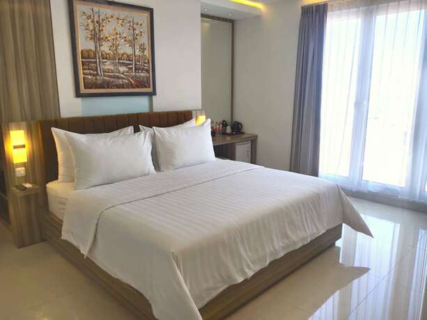Imagen de la habitación del Hotel Surabaya River View. Foto 12