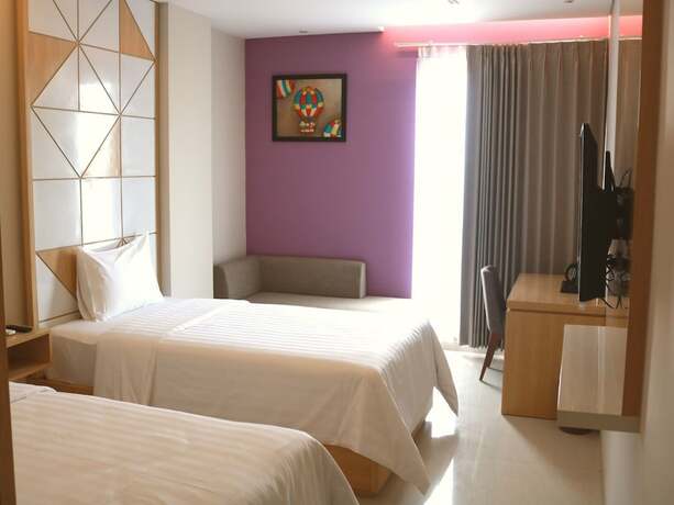 Imagen de la habitación del Hotel Surabaya River View. Foto 13