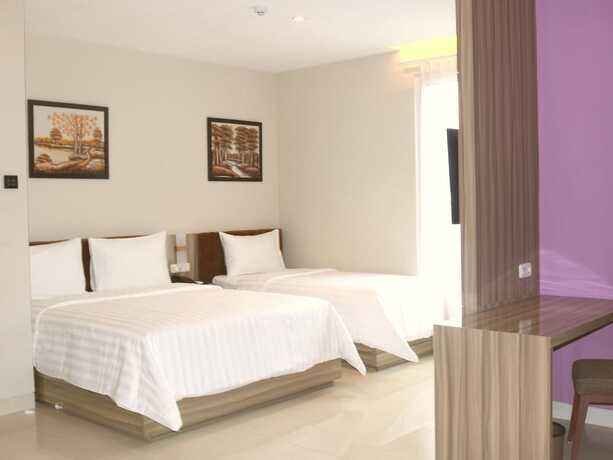 Imagen de la habitación del Hotel Surabaya River View. Foto 14