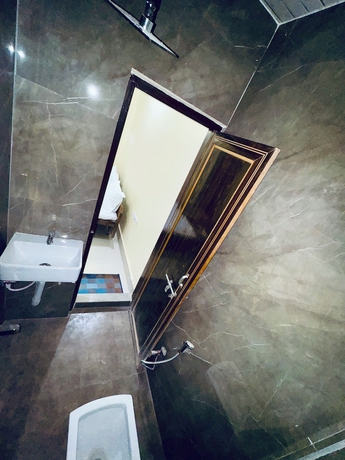 Imagen de la habitación del Hotel Suraj Guest House. Foto 13