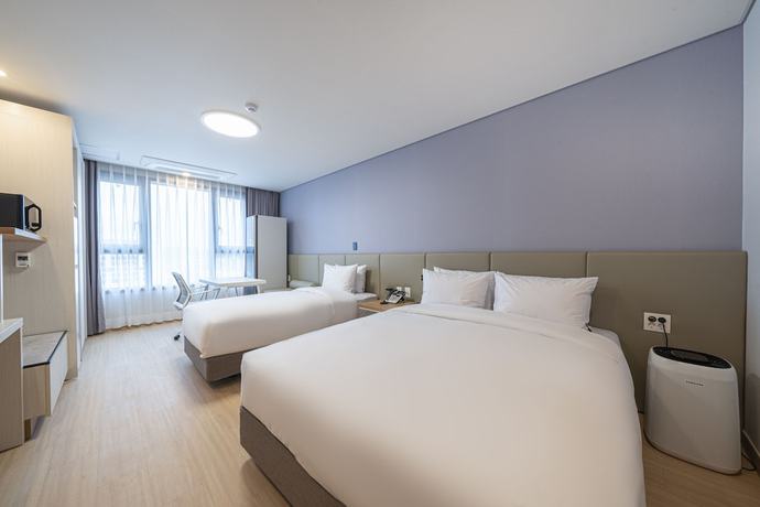 Imagen de la habitación del Hotel SureStay Plus Hotel By Best Western Asan. Foto 4