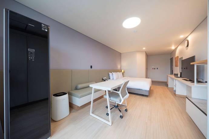 Imagen de la habitación del Hotel SureStay Plus Hotel By Best Western Asan. Foto 10