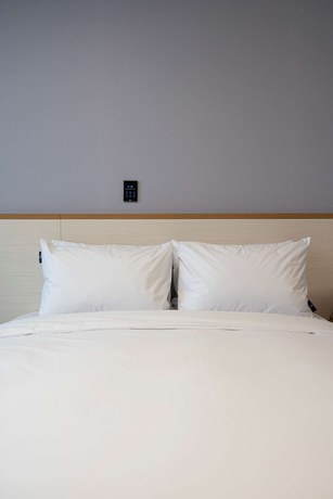 Imagen de la habitación del Hotel SureStay Plus Hotel By Best Western Asan. Foto 14