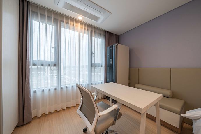 Imagen de la habitación del Hotel SureStay Plus Hotel By Best Western Asan. Foto 17