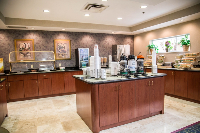 Imagen del bar/restaurante del Hotel SureStay Plus by Best Western Orlando Lake Buena Vista. Foto 3