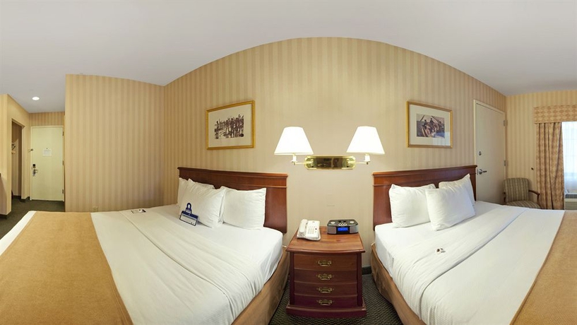 Imagen de la habitación del Hotel SureStay Plus by Best Western Woodbury Inn. Foto 4