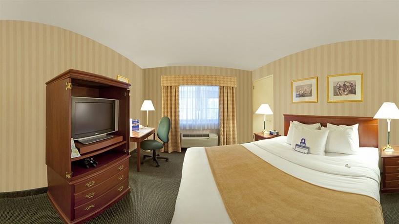 Imagen de la habitación del Hotel SureStay Plus by Best Western Woodbury Inn. Foto 7