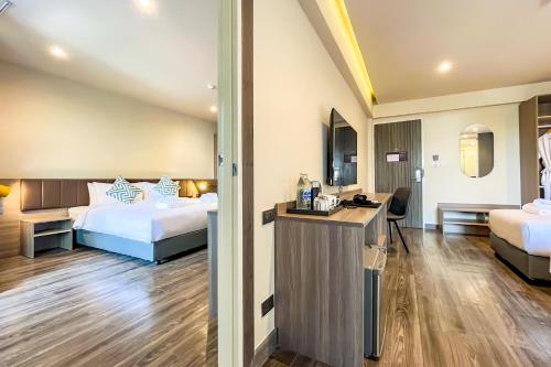 Imagen de la habitación del Hotel SureStay by Best Western Iconic Ari-Jatujak. Foto 18