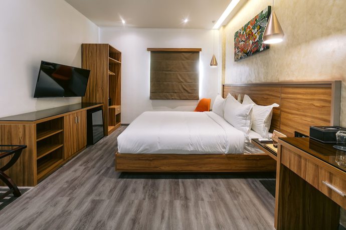 Imagen de la habitación del Hotel Surestay Plus By Best Western Ac Luxe Angeles City. Foto 10