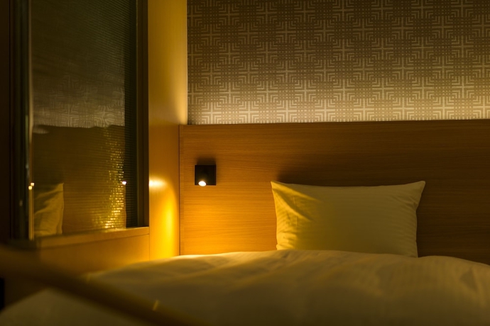 Imagen de la habitación del Hotel Surestay Plus By Best Western Shin-osaka. Foto 13