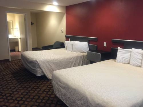 Imagen de la habitación del Hotel Surf City Inn and Suites. Foto 1