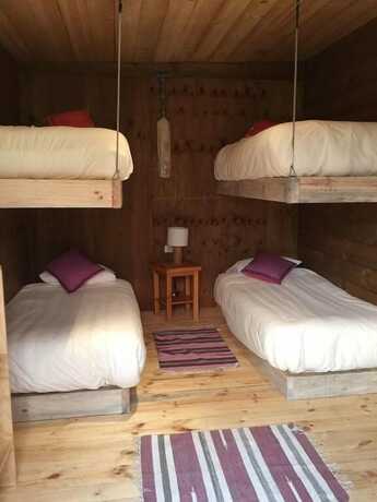 Imagen de la habitación del Hotel Surf Lodge Posada Punta de Lobos. Foto 12