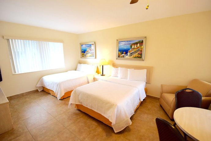 Imagen de la habitación del Hotel Surf Side Resort. Foto 7
