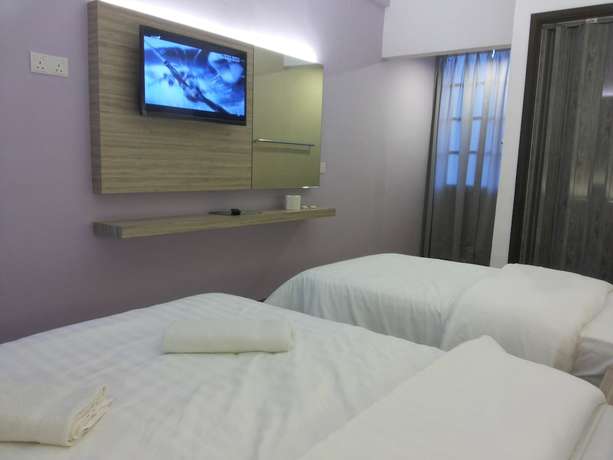 Imagen de la habitación del Hotel Suria Cameron. Foto 10