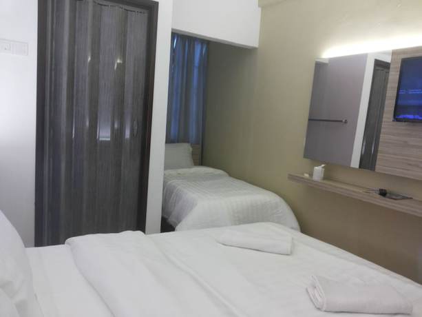 Imagen de la habitación del Hotel Suria Cameron. Foto 11