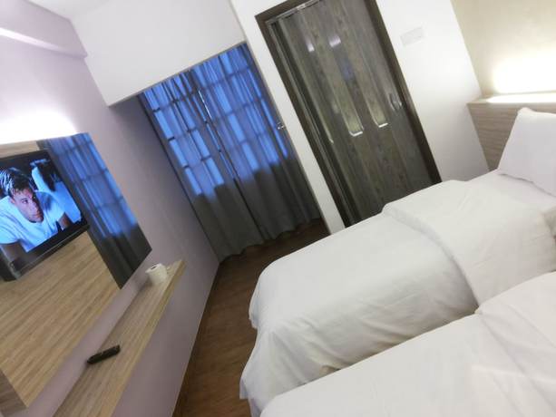 Imagen de la habitación del Hotel Suria Cameron. Foto 12
