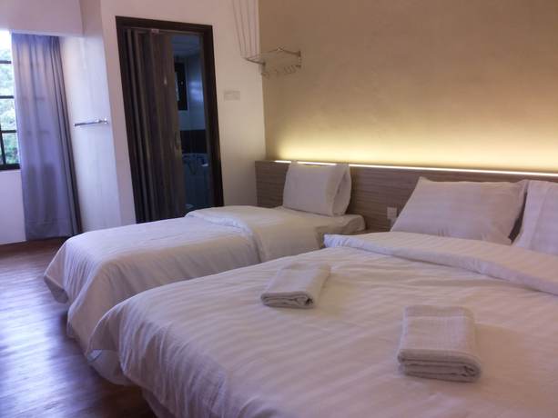 Imagen de la habitación del Hotel Suria Cameron. Foto 19