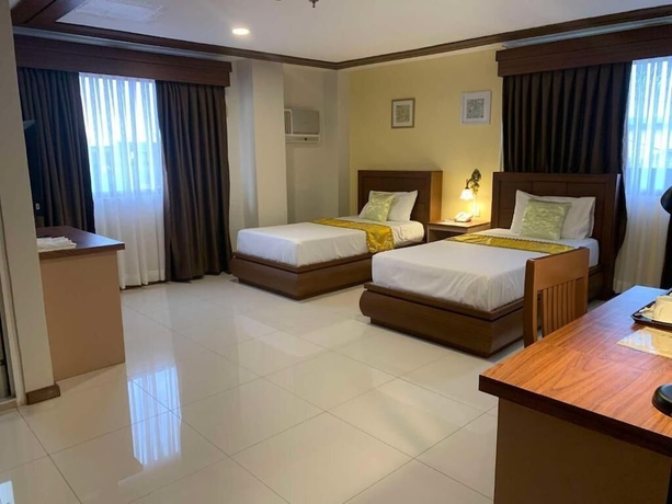 Imagen de la habitación del Hotel Surigao Royal Regency Suites. Foto 6