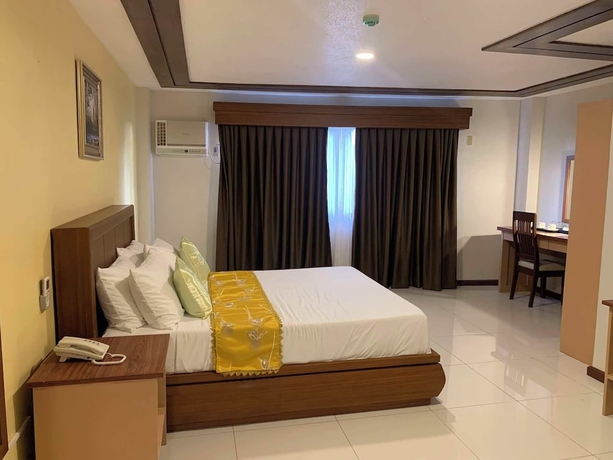 Imagen de la habitación del Hotel Surigao Royal Regency Suites. Foto 8