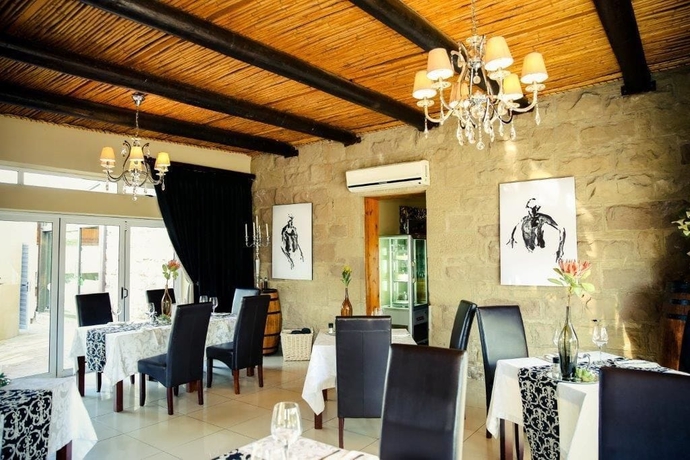 Imagen del bar/restaurante del Hotel Surval Boutique Olive Estate. Foto 8