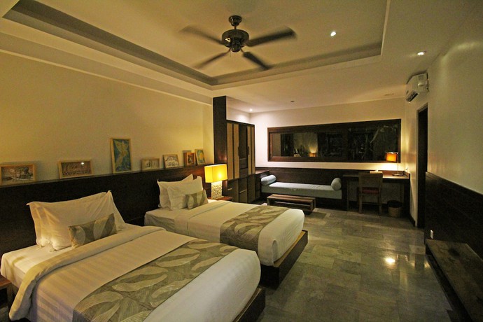Imagen de la habitación del Hotel Surya Kembar Villas. Foto 9