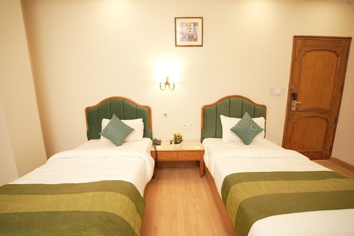 Imagen de la habitación del Hotel Surya Residency. Foto 8