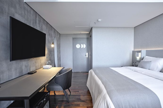 Imagen de la habitación del Hotel Suryaa Pinhais, Curio Collection by Hilton. Foto 4