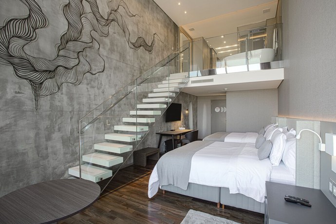 Imagen de la habitación del Hotel Suryaa Pinhais, Curio Collection by Hilton. Foto 6