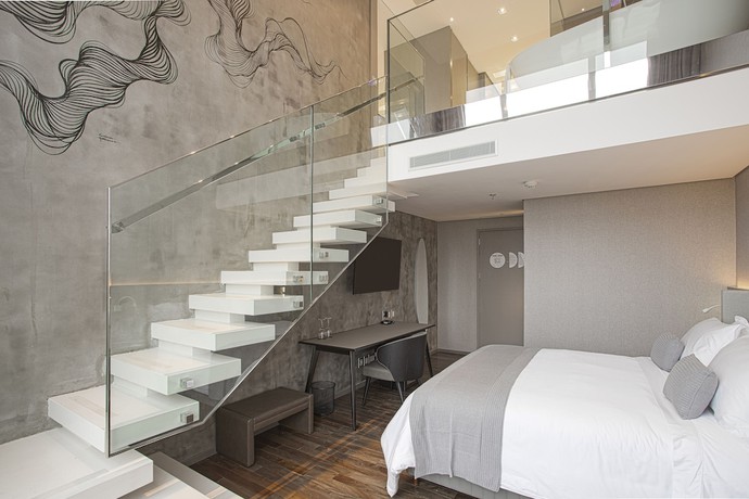 Imagen de la habitación del Hotel Suryaa Pinhais, Curio Collection by Hilton. Foto 7