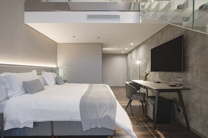 Imagen de la habitación del Hotel Suryaa Pinhais, Curio Collection by Hilton. Foto 12