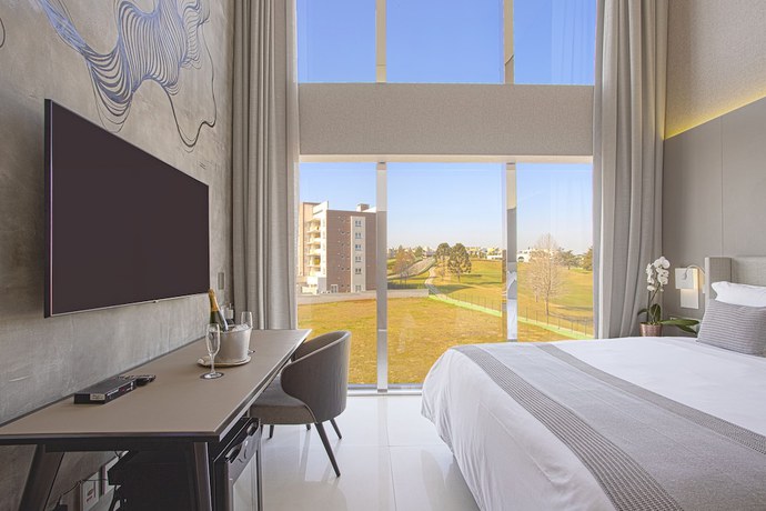 Imagen de la habitación del Hotel Suryaa Pinhais, Curio Collection by Hilton. Foto 14