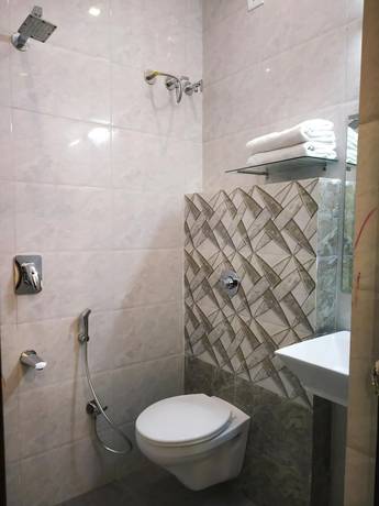 Imagen de la habitación del Hotel Suryansh. Foto 8
