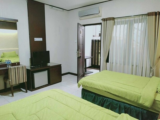 Imagen de la habitación del Hotel Sutan Raja Guest House. Foto 1