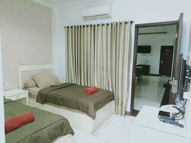 Imagen de la habitación del Hotel Sutan Raja Guest House. Foto 3