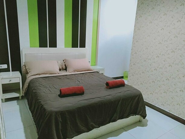 Imagen de la habitación del Hotel Sutan Raja Guest House. Foto 7
