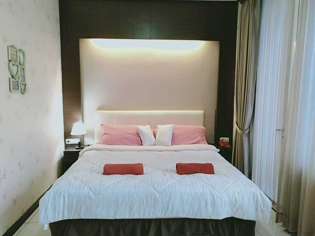 Imagen de la habitación del Hotel Sutan Raja Guest House. Foto 9