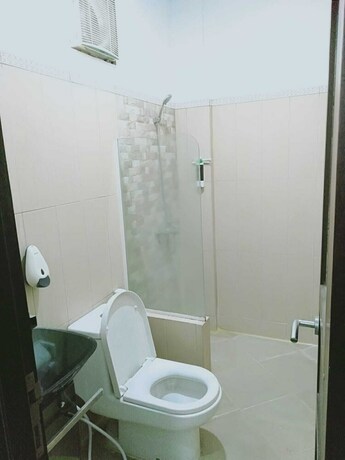 Imagen de la habitación del Hotel Sutan Raja Guest House. Foto 11