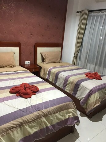 Imagen de la piscina del Hotel Sutan Raja Guest House. Foto 20