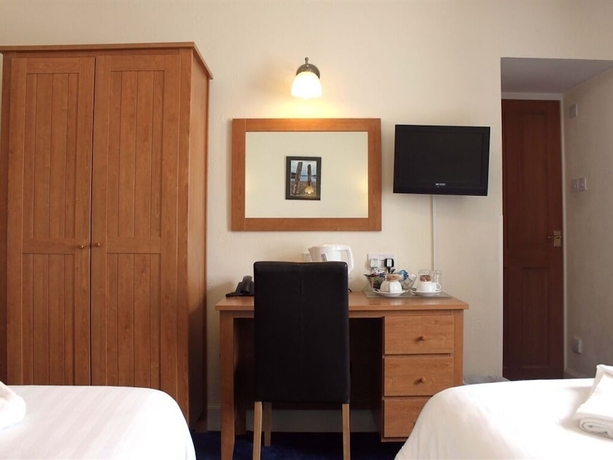 Imagen de la habitación del Hotel Sutherland Inn. Foto 8