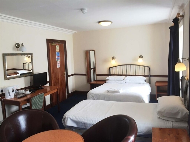 Imagen de la habitación del Hotel Sutherland Inn. Foto 10