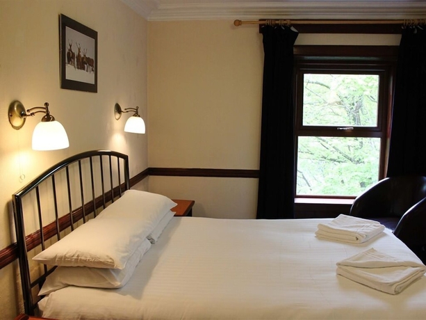 Imagen de la habitación del Hotel Sutherland Inn. Foto 11