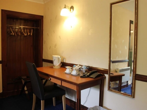 Imagen de la habitación del Hotel Sutherland Inn. Foto 12