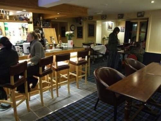 Imagen del bar/restaurante del Hotel Sutherland Inn. Foto 4
