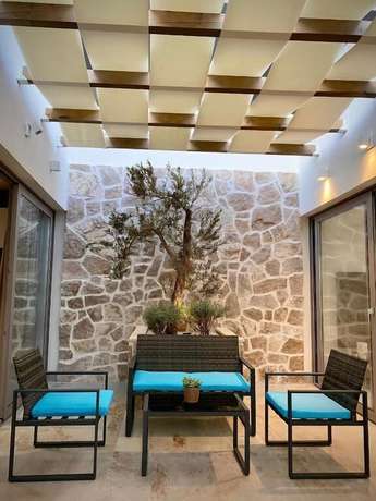 Imagen de la habitación del Hotel Sutivan Luxury Apartments. Foto 9