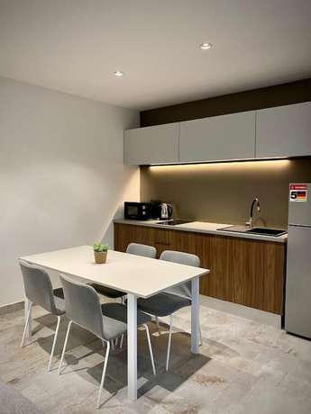 Imagen de la habitación del Hotel Sutivan Luxury Apartments. Foto 15