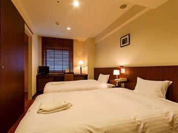 Imagen de la habitación del Hotel Sutton Hakata City. Foto 4