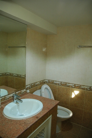 Imagen de la habitación del Hotel Suvarnabhumi Apartment. Foto 2