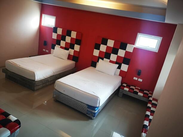 Imagen de la habitación del Hotel Suwannaphum Trang Resort. Foto 6