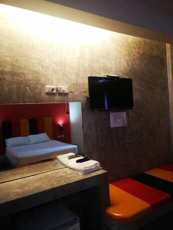 Imagen de la habitación del Hotel Suwannaphum Trang Resort. Foto 10