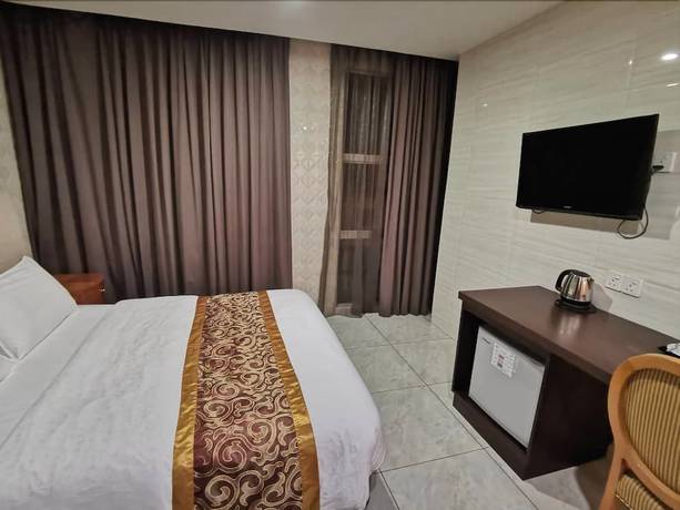 Imagen de la habitación del Hotel Suwara Hotel. Foto 14